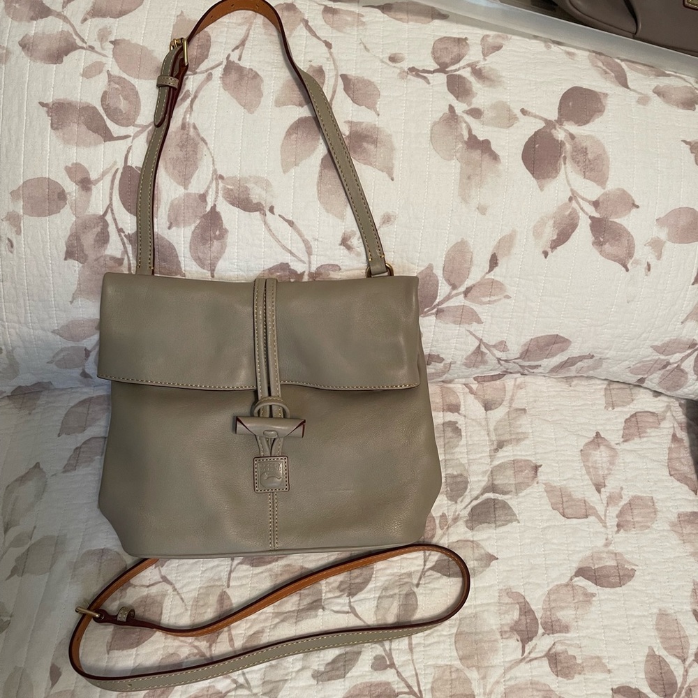 MAKE AN OFFER. 
Dooney and Bourke handbag with cross body strap